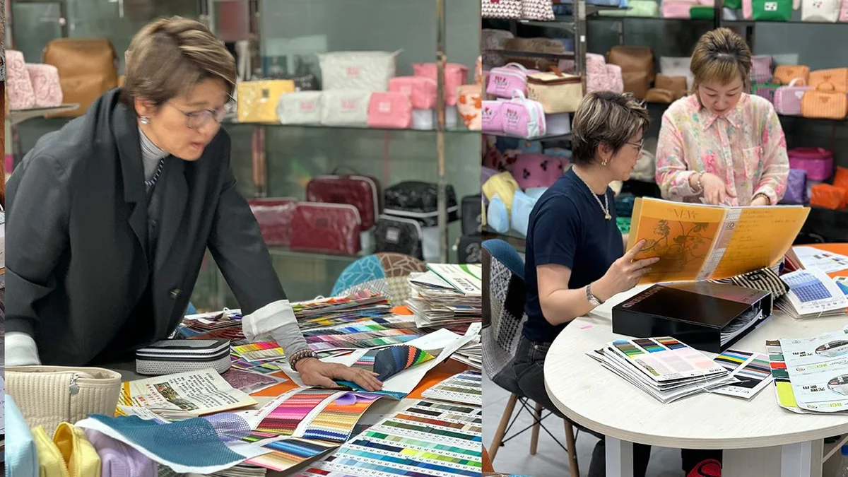 Sampling team reviewing fabric swatches and color cards