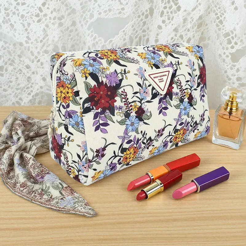 Corduroy makeup pouch with embroidered logo