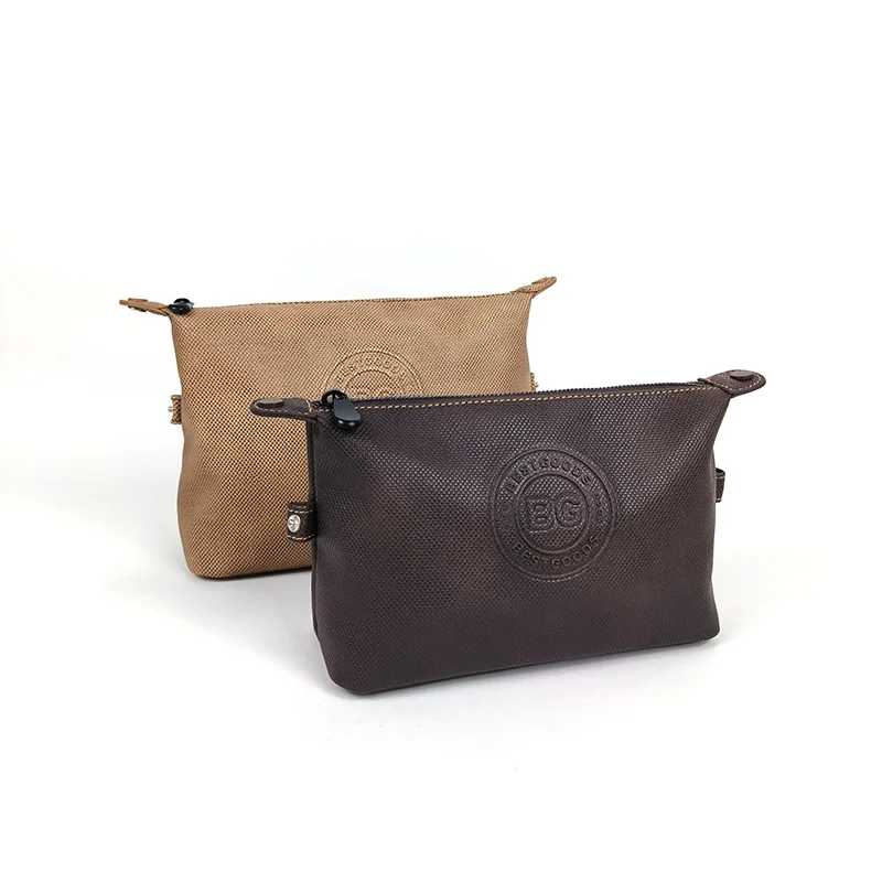 Two flat zip-top pouches in espresso brown and tan camel with debossed BG logo, on white background