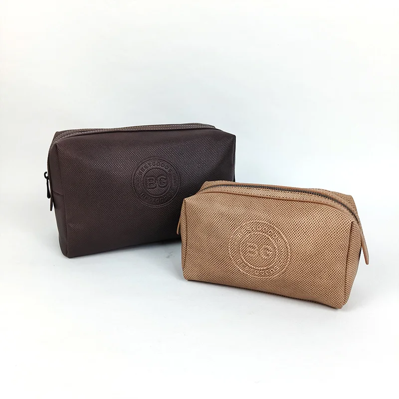 Two rectangular mesh cosmetic pouches in espresso brown and tan camel with debossed BG logo, zippers closed, on light gray background