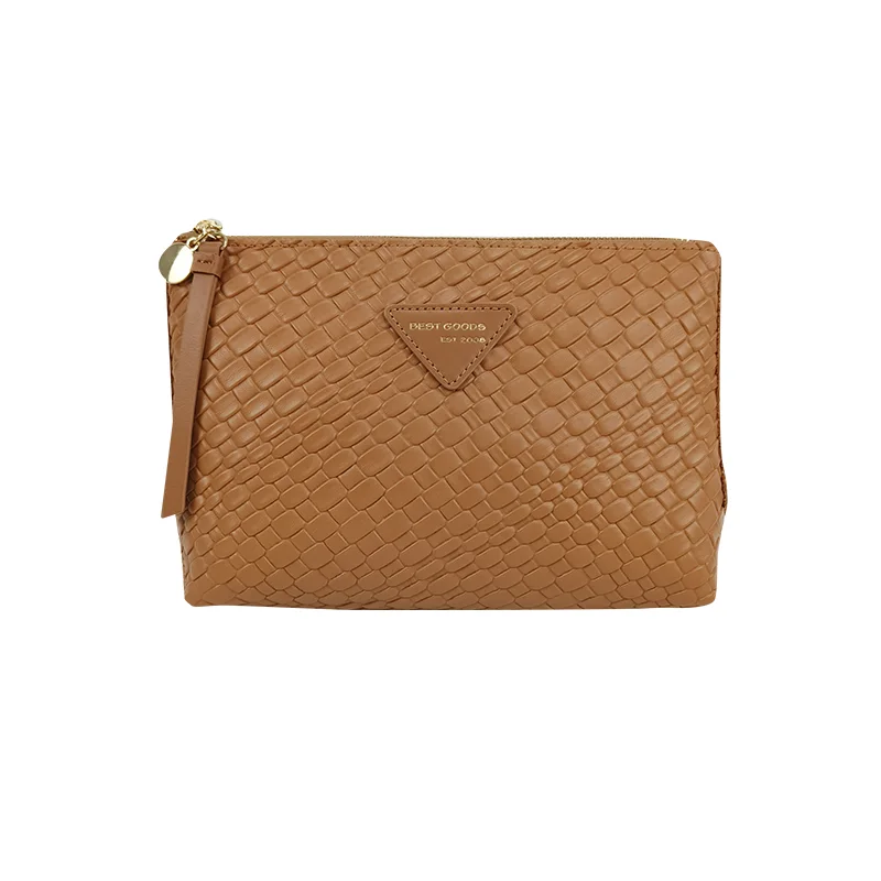 Tan-camel embossed woven-texture PU leather zip pouch with gold zipper pull, leather tassel and triangular BEST GOODS patch, on white background