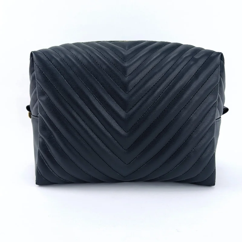 Black chevron-quilted cosmetic pouch with gold zipper hardware on white background, front view