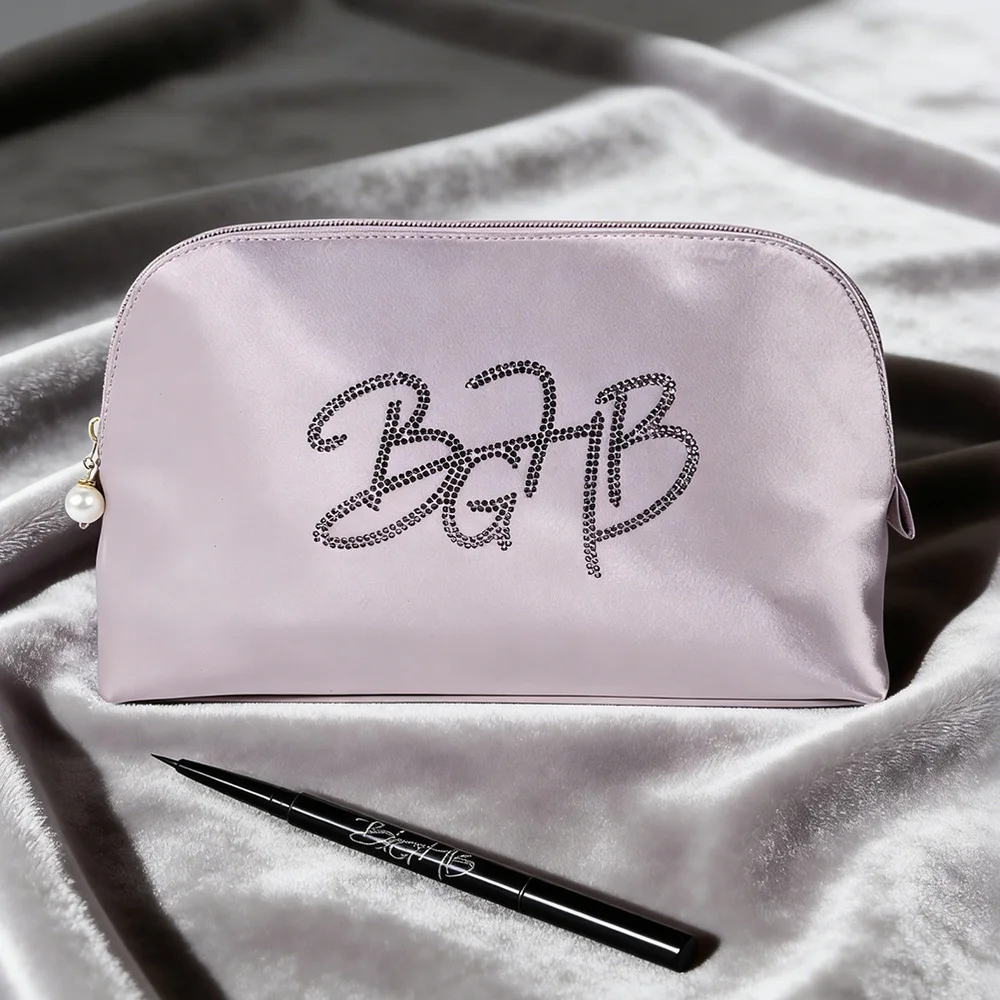Satin makeup pouch — smooth drape finish